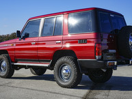 1991 JT1V0LJ7708000216 Medium Red Pearl - Outdoors